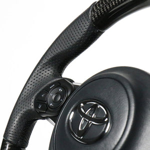 REAL ORIGINAL SERIES D SHAPE BLACK CARBON BLACK EURO STITCH STEERING WHEEL FOR TOYOTA PRIUS Α GR SPORT 40  GR-BKC-BK