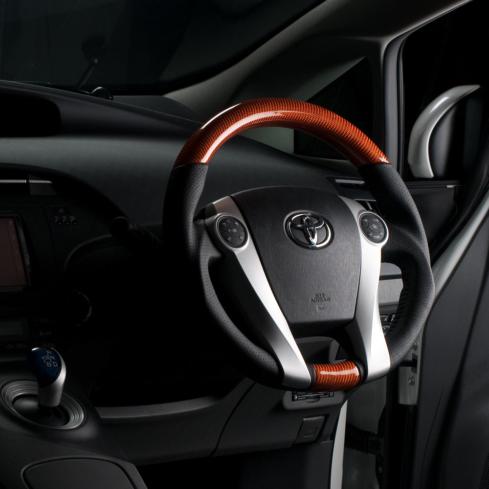 REAL ORIGINAL SERIES OVAL SHAPE ORANGE CARBON BLACK STITCH STEERING WHEEL FOR DAIHATSU MOBIUS ZVW41N  30-2-ORC