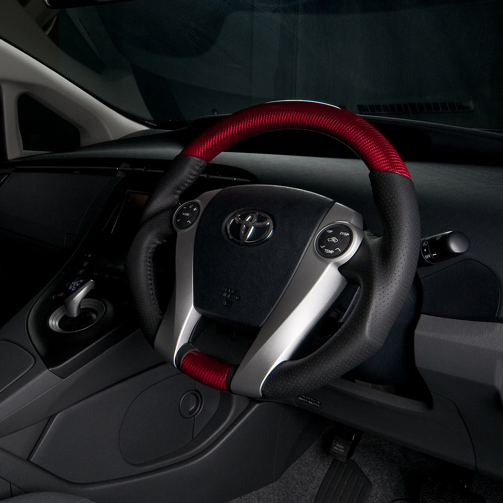 REAL ORIGINAL SERIES OVAL SHAPE RED CARBON BLACK STITCH STEERING WHEEL FOR TOYOTA AQUA NHP10  30-2-RC