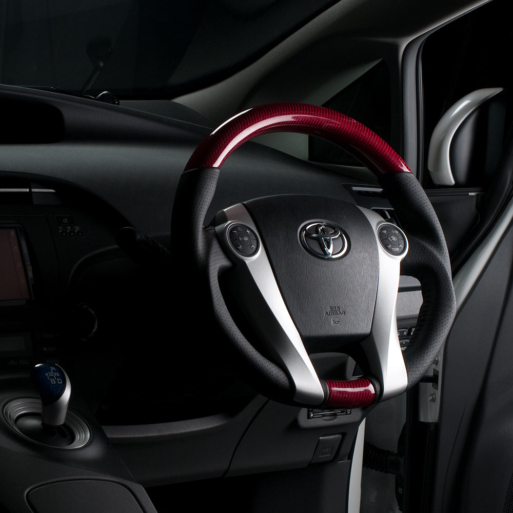 REAL ORIGINAL SERIES OVAL SHAPE RED CARBON BLACK STITCH STEERING WHEEL FOR TOYOTA AQUA NHP10  30-2-RC