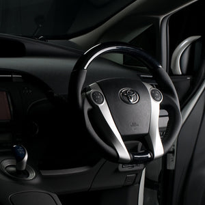 REAL ORIGINAL SERIES OVAL SHAPE BLACK CARBON BLACK STITCH STEERING WHEEL FOR TOYOTA PRIUS 30  30-2-BKC