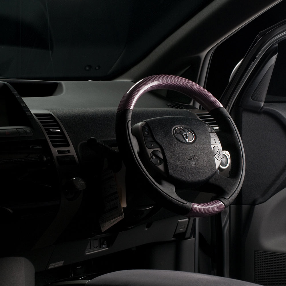 REAL ORIGINAL SERIES OVAL SHAPE PINK CARBON BLACK STITCH STEERING WHEEL FOR TOYOTA PRIUS 20  20-1-PC