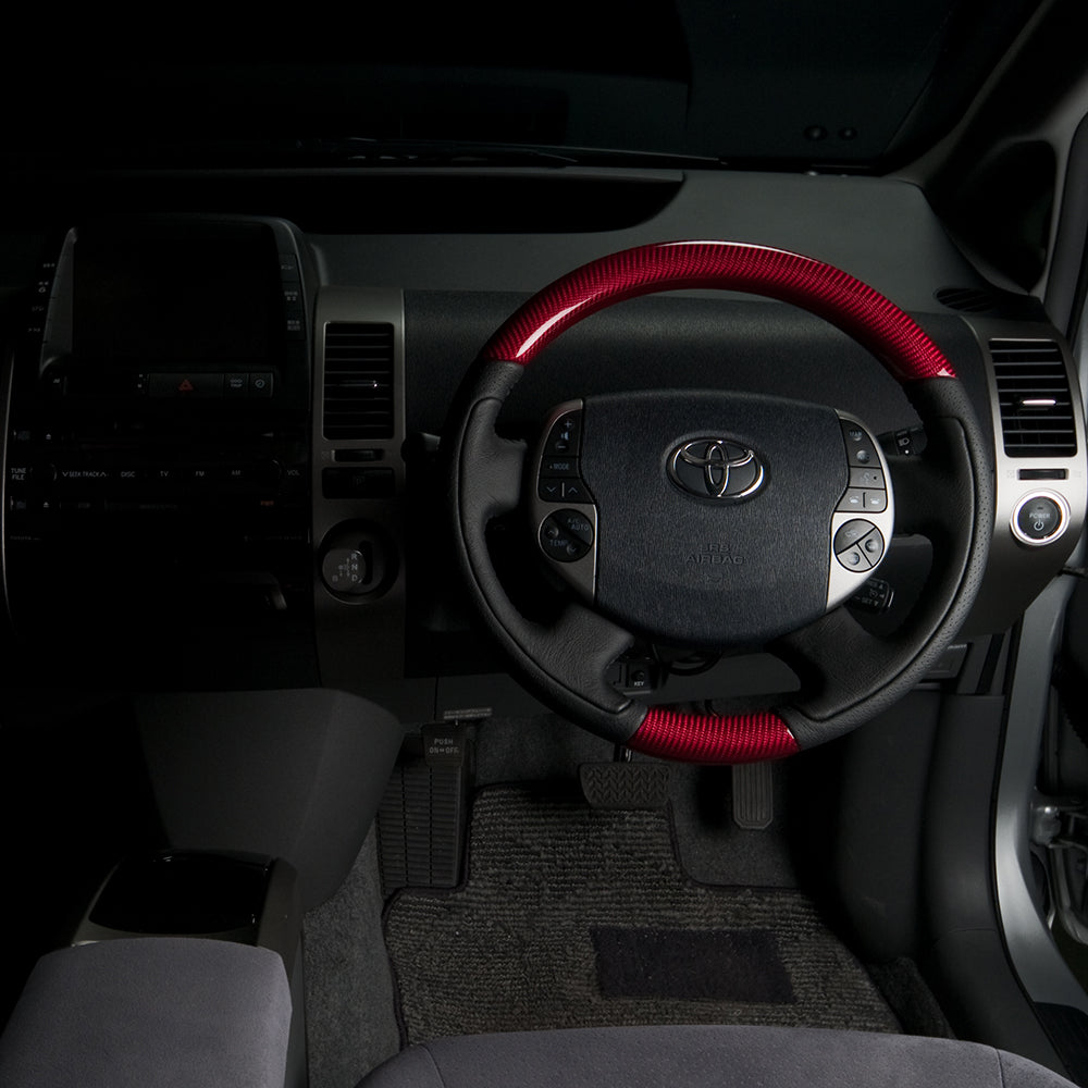 REAL ORIGINAL SERIES OVAL SHAPE RED CARBON BLACK STITCH STEERING WHEEL FOR TOYOTA PRIUS 20  20-1-RC