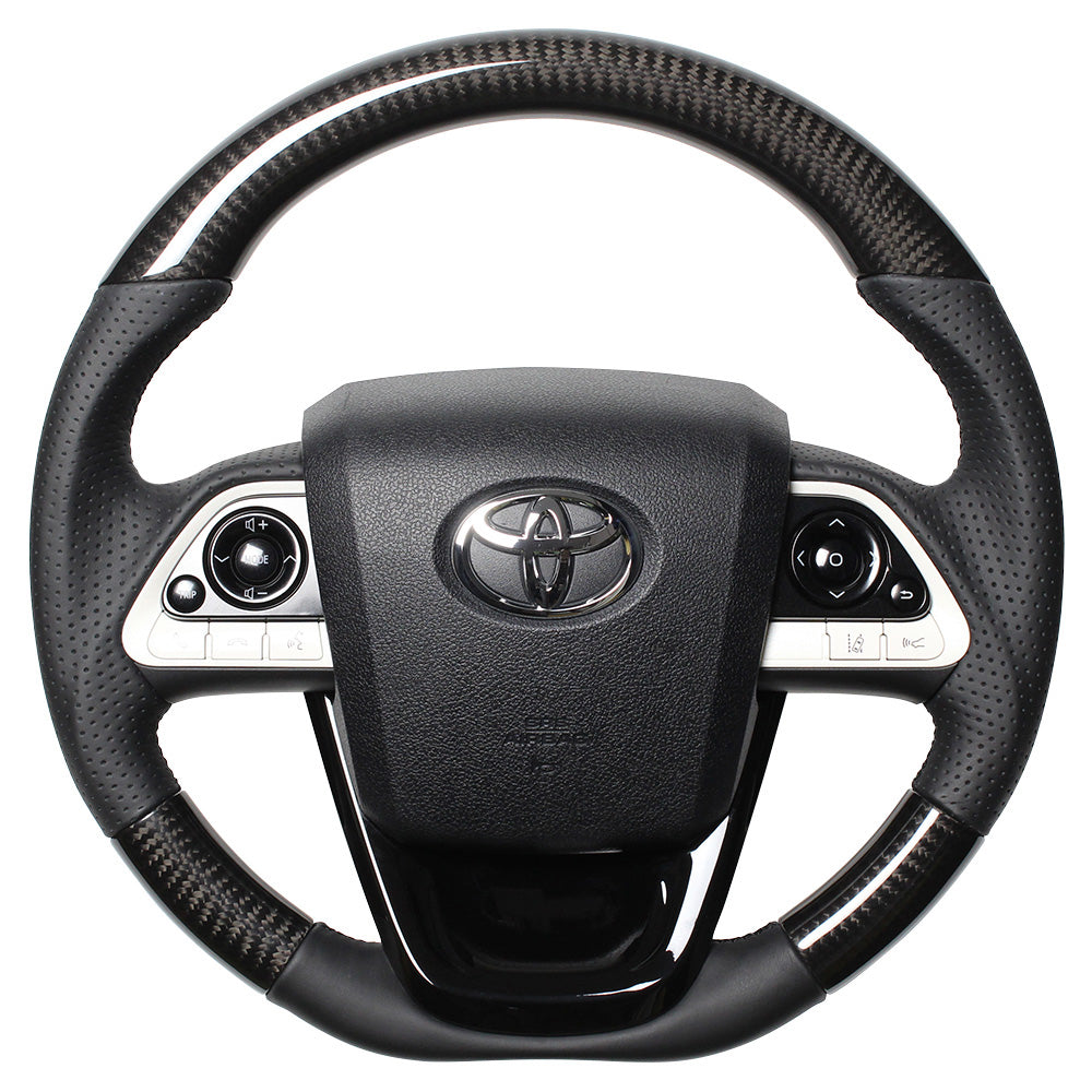 REAL PREMIUM SERIES SET BLACK CARBON STEERING + PIANO BLACK UNDER PAD BLACK EURO STITCH STEERING WHEEL FOR TOYOTA PRIUS 50  50P-BKC-BK-PBP