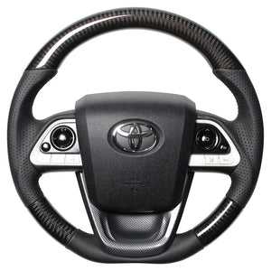 REAL PREMIUM SERIES SET BLACK CARBON STEERING + BLACK CARBON PRINT UNDER PAD BLACK EURO STITCH STEERING WHEEL FOR TOYOTA PRIUS 50  50P-BKC-BK-BKT