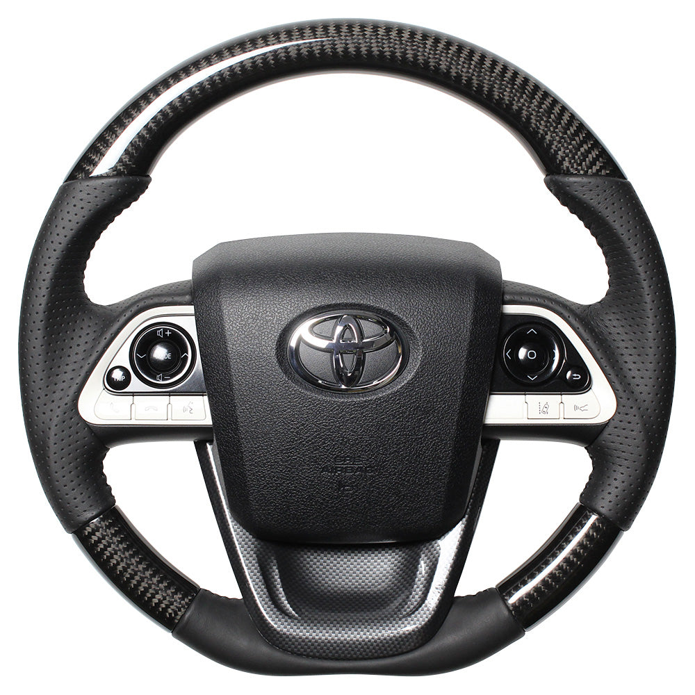 REAL ORIGINAL SERIES SET BLACK CARBON STEERING + BLACK CARBON PRINT UNDER PAD BLACK STITCH STEERING WHEEL FOR TOYOTA MIRAI 10  50-BKC-BK-BKT