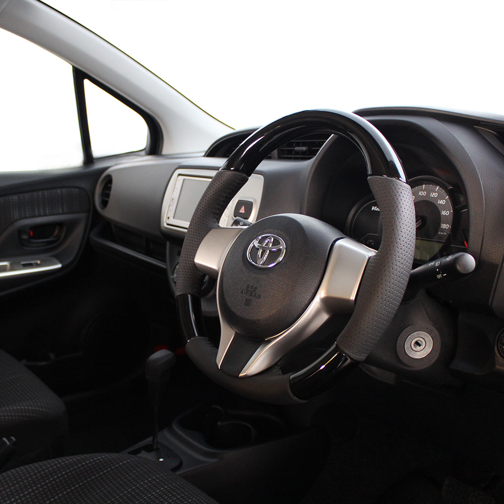 REAL ORIGINAL SERIES SOFT D SHAPE PIANO BLACK BLACK STITCH STEERING WHEEL FOR SUBARU TRESIA 120  P130-PBW-BK