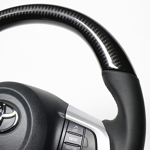REAL ORIGINAL SERIES SOFT D SHAPE BLACK CARBON BLACK STITCH STEERING WHEEL FOR DAIHATSU ATRAI WAGON S321G: KOUKI S331G: KOUKI  M90-BKC-BK