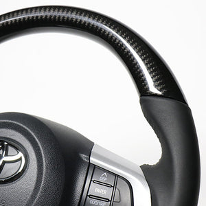 REAL ORIGINAL SERIES SOFT D SHAPE BLACK CARBON BLACK STITCH STEERING WHEEL FOR DAIHATSU ATRAI WAGON S321G: KOUKI S331G: KOUKI  M90-BKC-BK