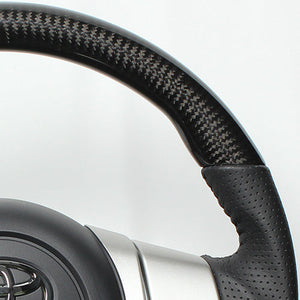 REAL ORIGINAL SERIES SOFT D SHAPE BLACK CARBON BLACK STITCH STEERING WHEEL FOR TOYOTA FJ CRUISER GSJ15W FJ-PX-BKC