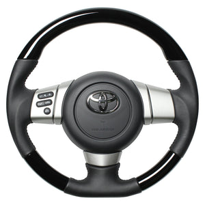 REAL ORIGINAL SERIES SOFT D SHAPE PIANO BLACK BLACK STITCH STEERING WHEEL FOR TOYOTA FJ CRUISER GSJ15W FJ-PBW-BK