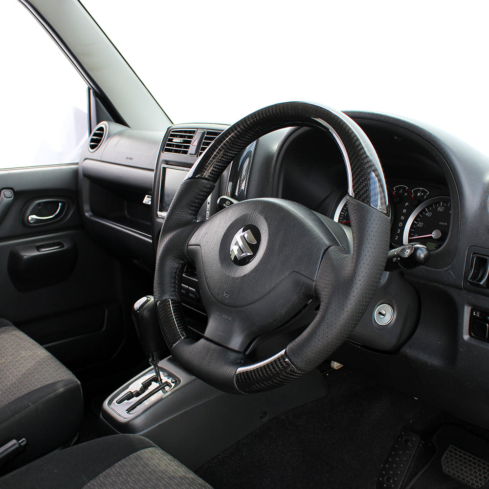 REAL ORIGINAL SERIES SOFT D SHAPE BLACK CARBON BLACK STITCH STEERING WHEEL FOR SUZUKI JIMNY SIERRA JB43W: 4-8 TYPE  JB-BKC-BK