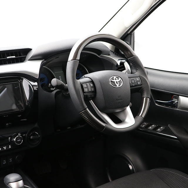 REAL ORIGINAL SERIES SOFT D SHAPE BLACK CARBON BLACK STITCH STEERING WHEEL FOR TOYOTA HILUX GUN125 N125-BKC-BK