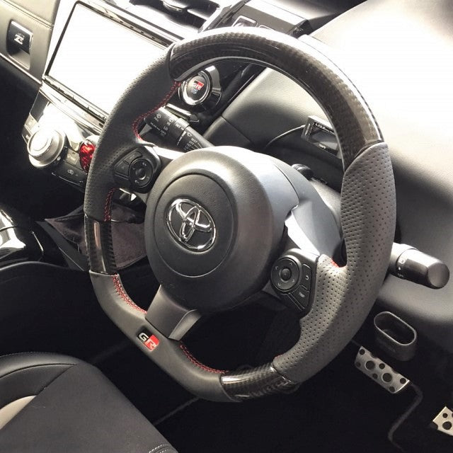 REAL ORIGINAL SERIES EMBLEM TYPE D SHAPE BLACK CARBON RED X BLACK EURO STITCH STEERING WHEEL FOR TOYOTA VOXY GR SPORT 80  GRM-BKC-RD