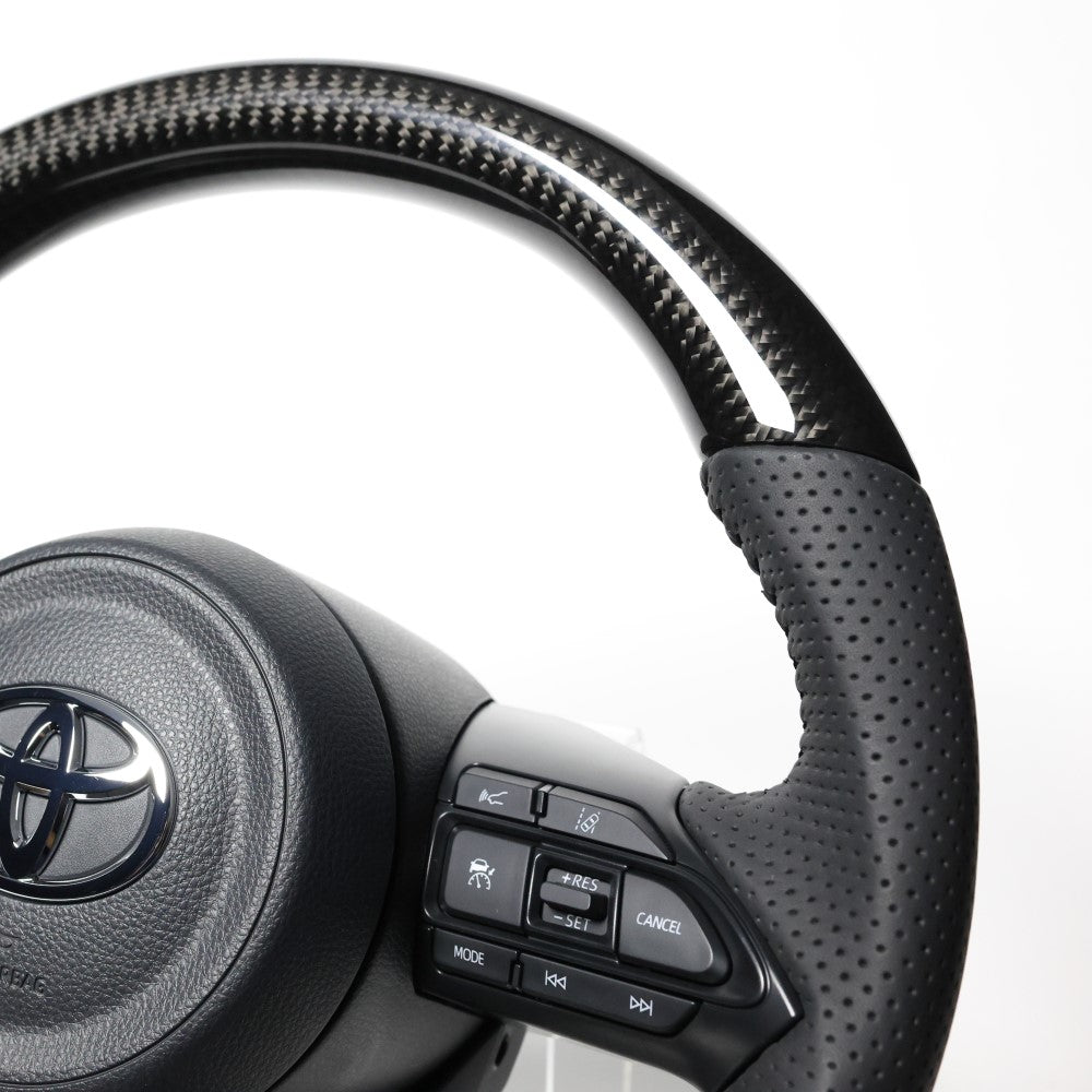REAL ORIGINAL SERIES D SHAPE BLACK CARBON BLACK STITCH STEERING WHEEL FOR TOYOTA YARIS CROSS GR SPORT MXPJ10 MXPB10  TYJ-BKC