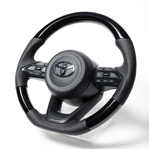 REAL ORIGINAL SERIES D SHAPE PIANO BLACK BLACK STITCH STEERING WHEEL FOR TOYOTA AQUA GR SPORT MXPK11  TYJ-PBW