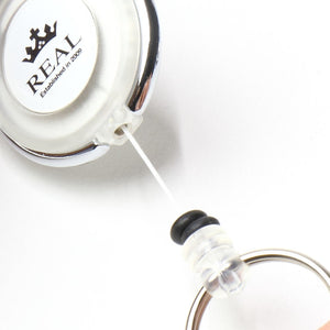 REAL REEL KEYCHAIN WITH REAL LOGO SMALL WHITE REAL-REEL-WH