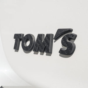 TOMS CARBON EMBLEM MATT FOR  08233-TS005